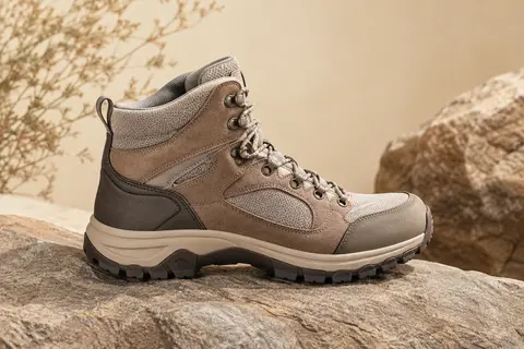 Chaussure montante de randonnée en cuir, daim et maille, avec une semelle extérieure en caoutchouc